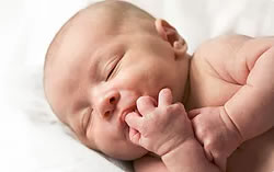 Building Positive Sleep Associations From Birth >>